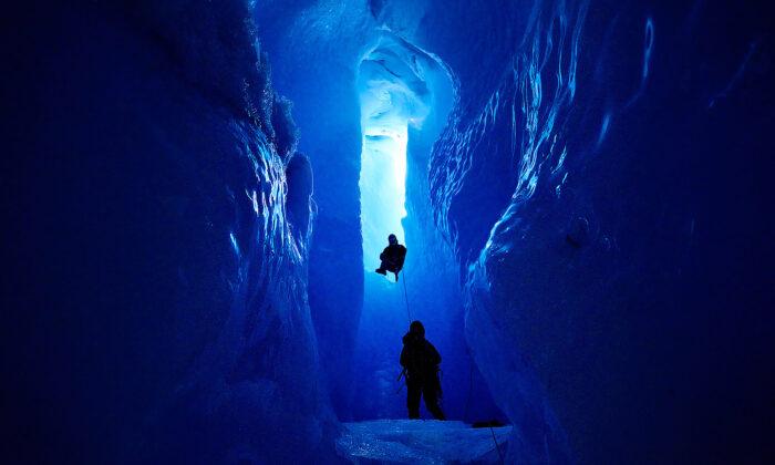 Explorer Snaps Awe-Inspiring Photos Inside the Treacherous Ice Caves of Greenland’s Ice Sheet