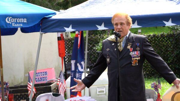 David Christian, veteran, co-founder of Vietnam Veterans of America, gives a speech at the RightForBucks 9/11 event, on Sept. 11, 2021. (William Huang/The Epoch Times)