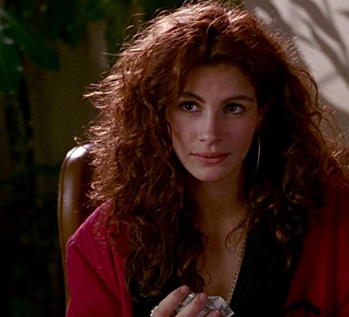 Miss Vivian (Julia Roberts) tearfully explains that she has all this money and no one to help her figure out which clothes to buy, in “Pretty Woman.” (Buena Vista Pictures/Touchstone Pictures)