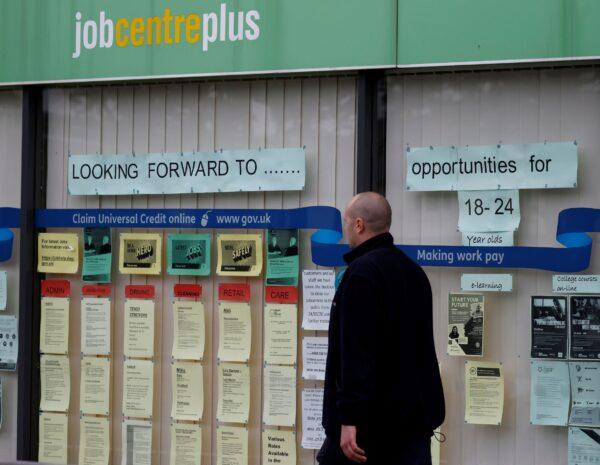 A man walks past a job centre following the outbreak of COVID-19, in Manchester, Britain, on July 8, 2020. (Phil Noble/Reuters)