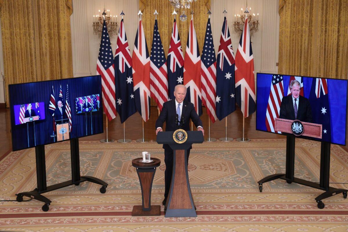 President Joe Biden speaks during an event with Australian Prime Minister Scott Morrison (L) and United Kingdom Prime Minister Boris Johnson (R) in the East Room of the White House in Washington, on Sept. 15, 2021. (Win McNamee/Getty Images)