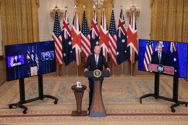 President Joe Biden speaks during an event with Australian Prime Minister Scott Morrison (L) and United Kingdom Prime Minister Boris Johnson (R) in the East Room of the White House in Washington on Sept. 15, 2021. (Win McNamee/Getty Images)