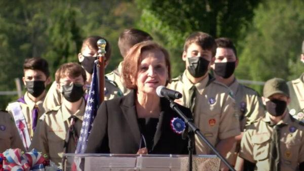 Judi Reiss, the Bucks County Chief Prosecutor, gives a speech at the morning ceremony memorializing the 20th Anniversary of 9/11, at the Garden of Reflection in Lower Makefield Township, Pa., on Sept. 11, 2021. (Lower Makefield Township YouTube Channel/Screenshot via The Epoch Times)