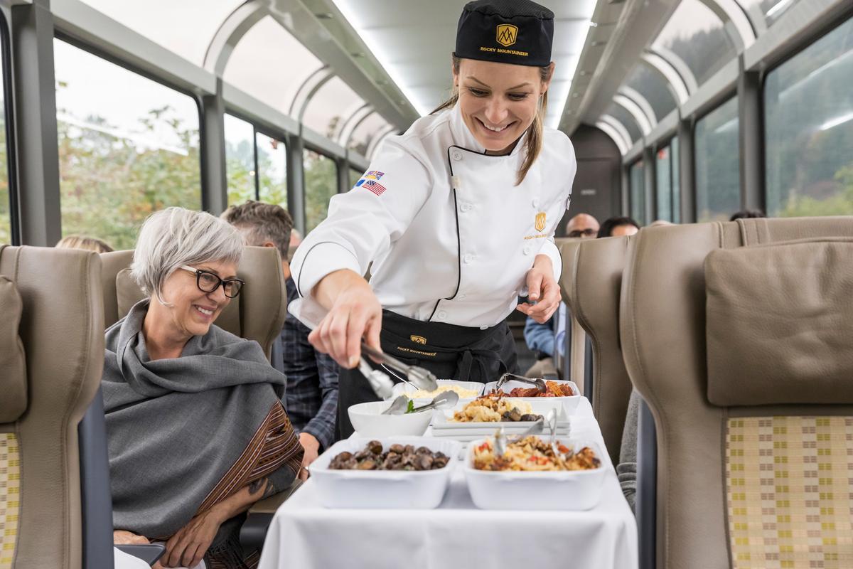 A chef serves lunch in SilverLeaf coach. (Rocky Mountaineer)