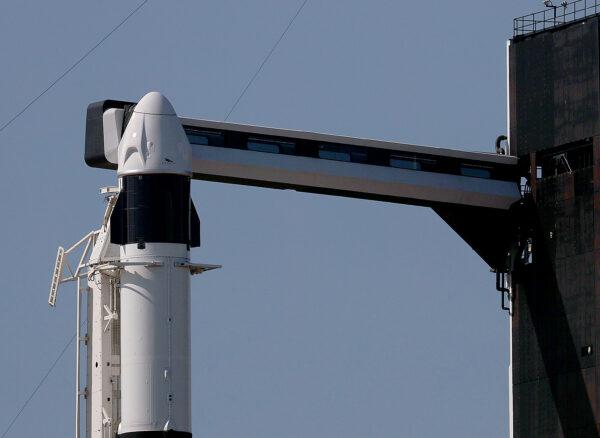 The SpaceX Falcon 9 rocket and Crew Dragon sit on launch Pad 39A at NASA’s Kennedy Space Center as it is prepared for the first completely private mission to fly into orbit in Cape Canaveral, Fla., on Sept. 15, 2021. (Joe Raedle/Getty Images)