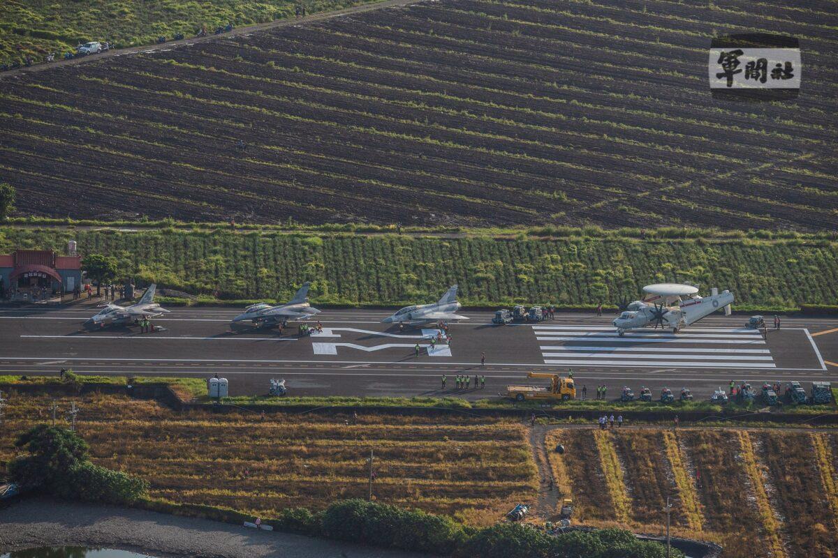 Taiwanese Air Force fighter jets park on a highway that is converted as a runway during the take-off and landing drill as part of the annual Han Kuang drill in Pingtung, Taiwan, on Sept. 15, 2021. (Taiwan Military News Agency/Handout via Reuters)