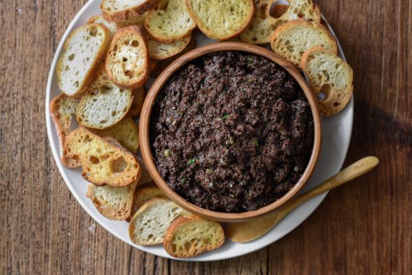 The texture of your tapenade should be spreadable, yet slightly gritty, with tiny chunks of olives and capers still visible. (Audrey Le Goff)