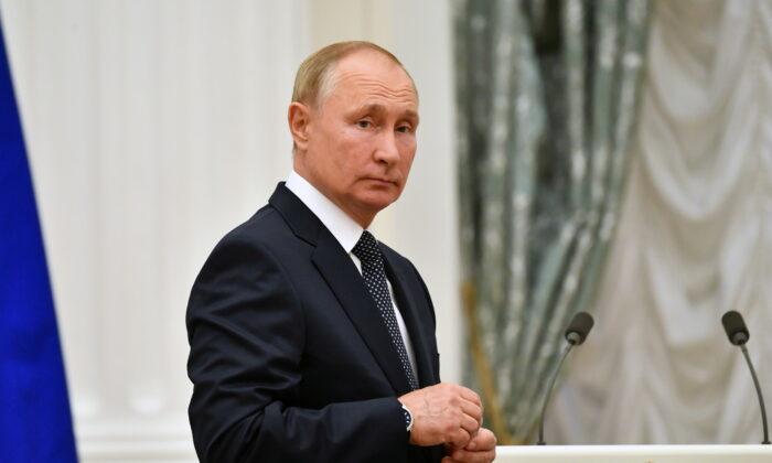 Russia’s Putin Says He Will Be in COVID-19 Self-Isolation ‘A Few Days’