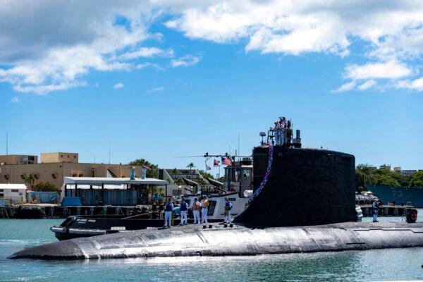 The Virginia-class nuclear-powered attack submarine USS Illinois (SSN 786) returns home to Joint Base Pearl Harbor-Hickam from a deployment in the 7th Fleet area of responsibility on Sept. 13, 2021. (Mass Communication Specialist 1st Class Michael B. Zingaro/U.S. Navy via AP)