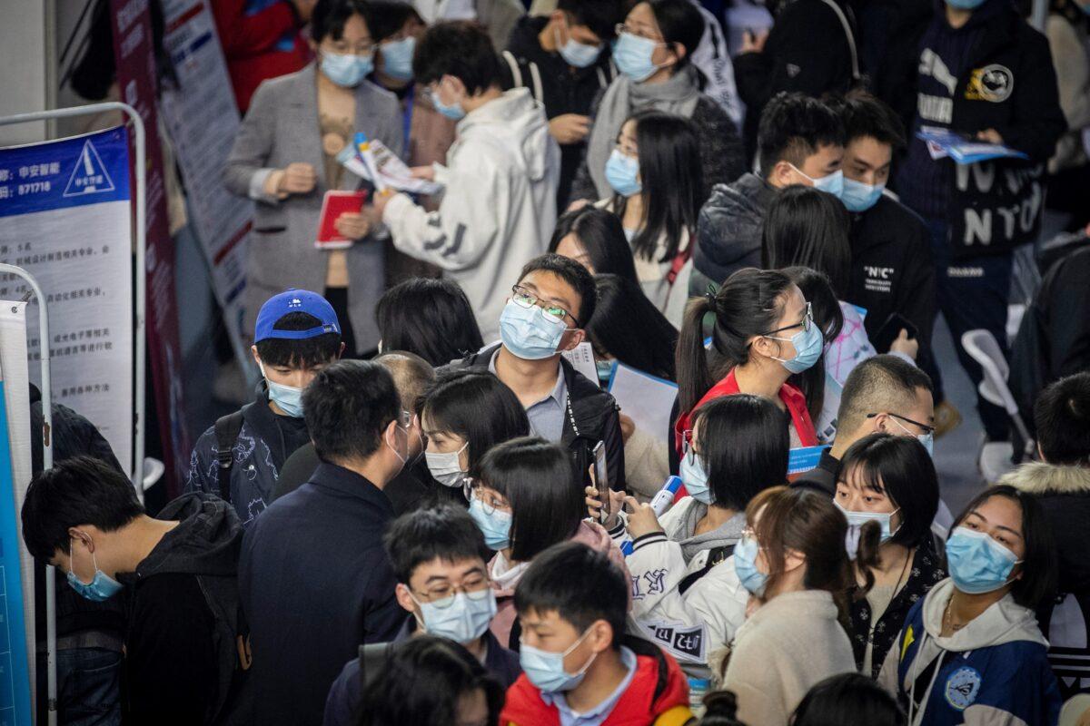 University graduates attend a career fair in Wuhan, Hubei Province, China, on March 21, 2021. (STR/AFP/Getty Images)