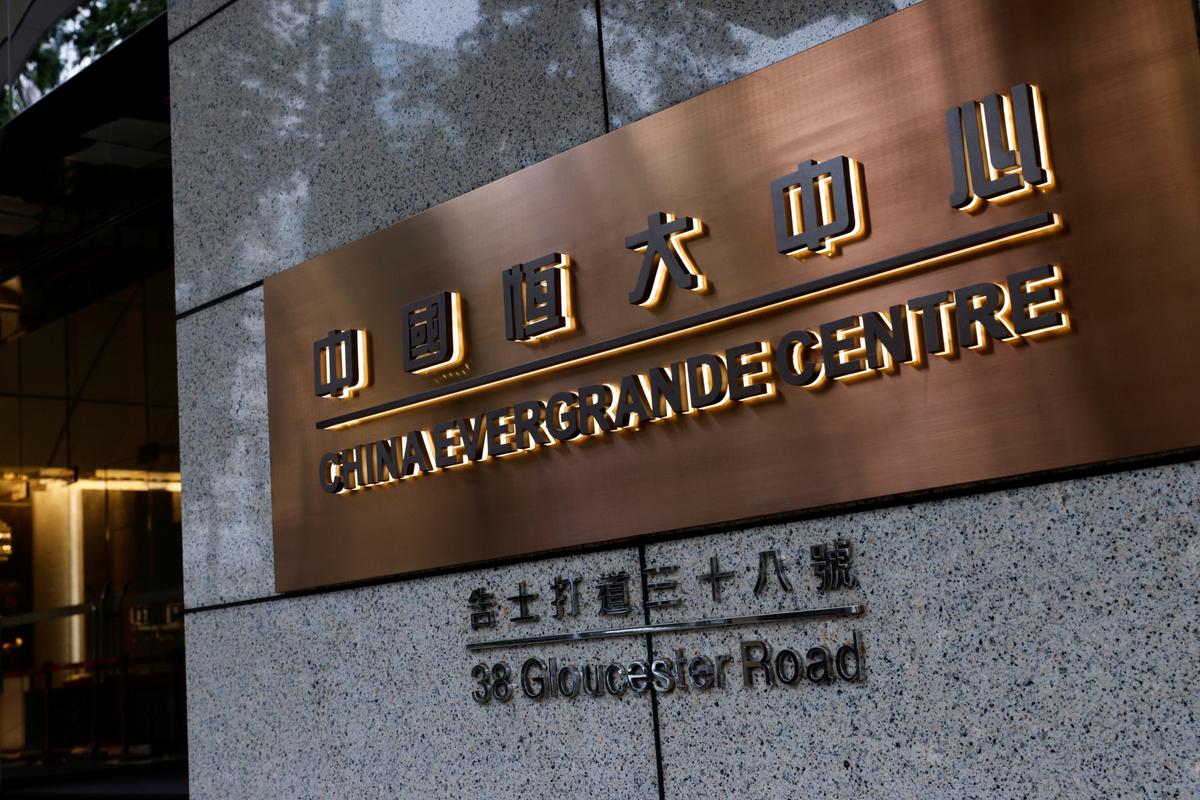 China Evergrande Halts Electric Car Unit’s Listing Plan, Shares Tumble