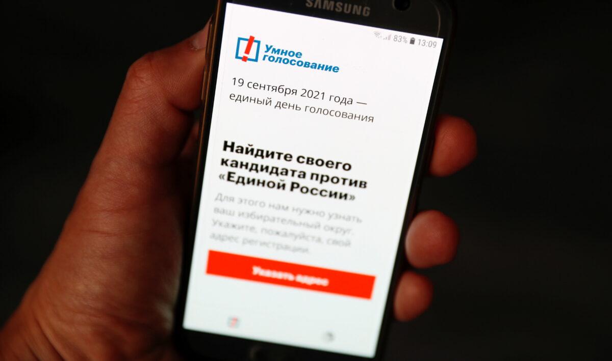The Russian opposition politician Alexei Navalny's Smart Voting app is seen on a phone, in Moscow, Russia, on Sept. 16, 2021. (Shamil Zhumatov/Reuters)