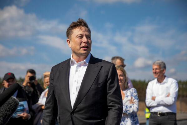 Tesla CEO Elon Musk talks to the press as he arrives to have a look at the construction site of the new Tesla Gigafactory near Gruenheide, Germany on Sept. 03, 2020. (Maja Hitij/Getty Images)