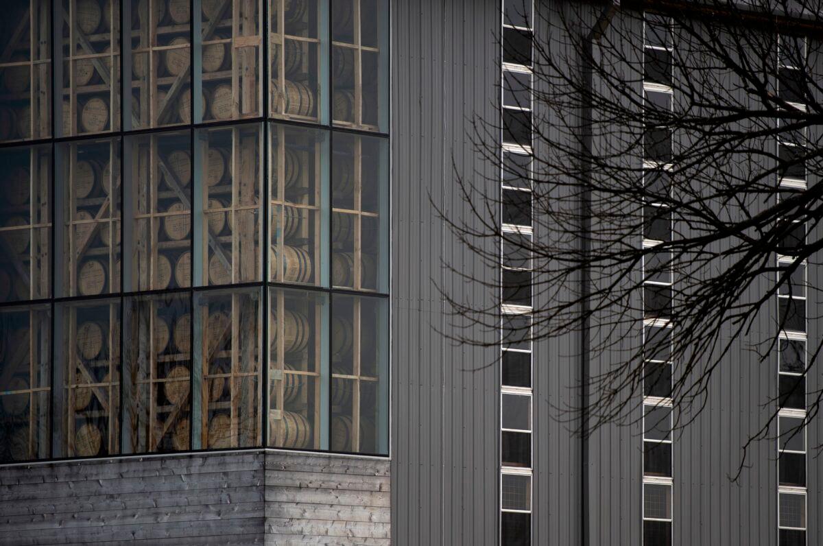 Barrels of bourbon are seen inside of a closed storage building as they age at the Bardstown Bourbon Company in Bardstown, Kentucky on April 11, 2019. (Andrew Caballero-Reynolds / AFP via Getty Images)