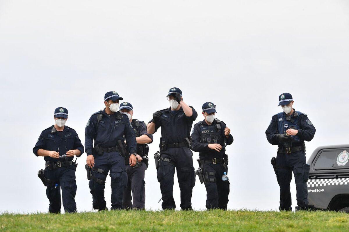 Police patrol Sydney Park, following calls for a protest rally amid the COVID-19 pandemic in Sydney, on Sept. 18, 2021. (Saeed Khan/AFP via Getty Images)