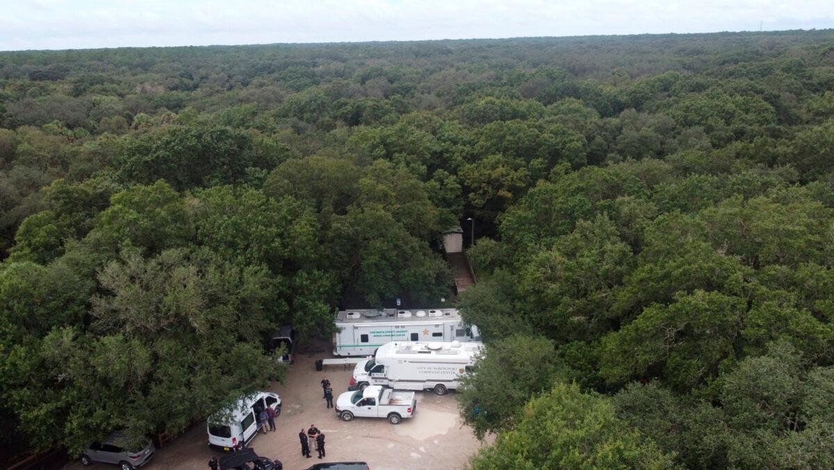 Law enforcement officials conduct a search for Brian Laundrie in the Carlton Reserve in Sarasota, Fla., on Sept. 18, 2021. (North Port Police Department via AP)