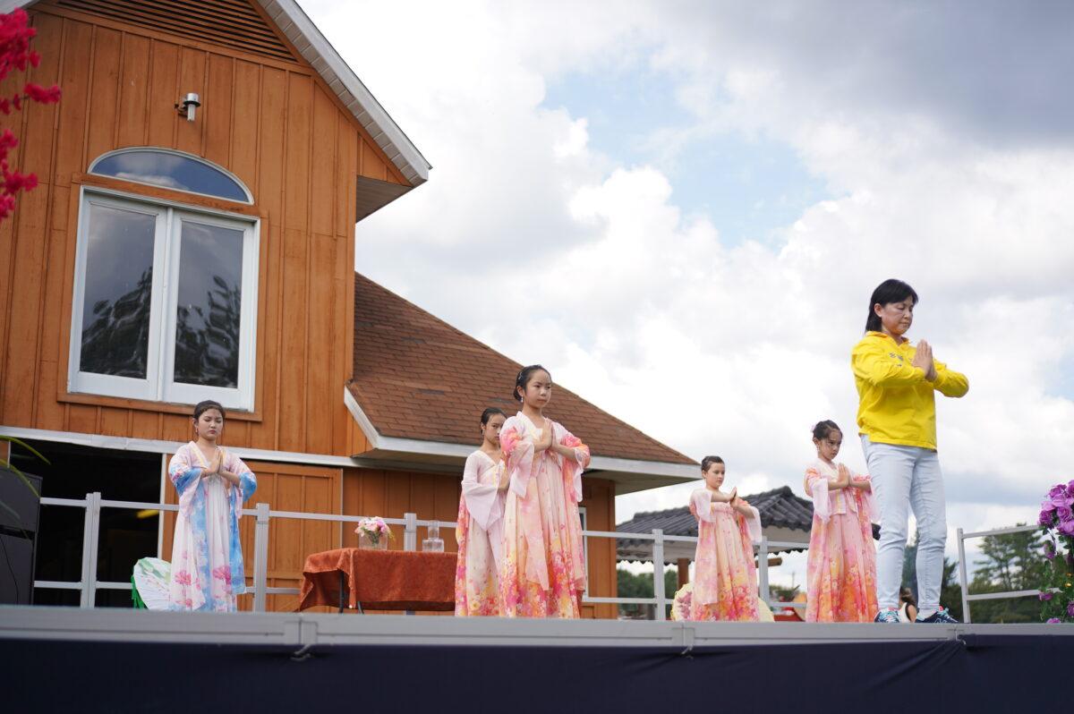 Falun Dafa exercises demonstration during Mid-Autumn festival in New Century Film, at Port Jervis, New York, on Sep 18, 2021. (Enrico Trigoso/The Epoch Times)