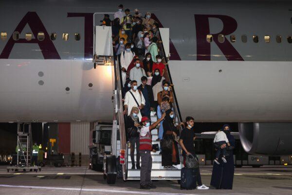 Evacuees from Afghanistan arrive at Hamad International Airport in Qatar's capital Doha on Sept. 10, 2021. (Karim Jaafar/AFP via Getty Images)