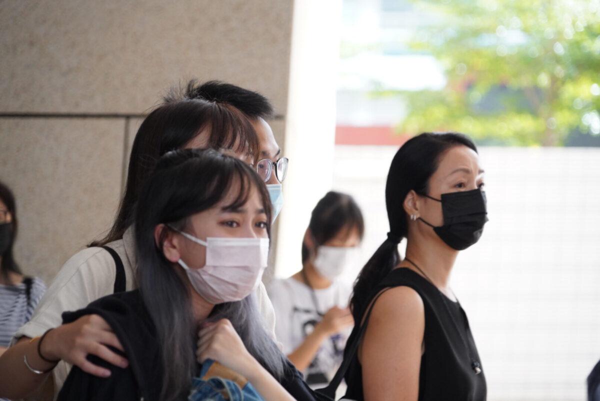 Audience walked out from the West Kowloon Court in Hong Kong on Sept. 21, 2021. (Andrian Yu/The Epoch Times)