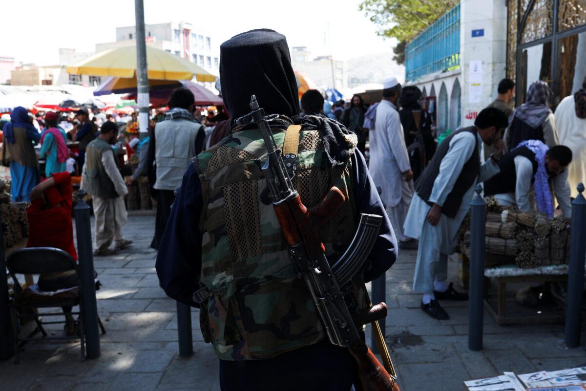 <span style="color: #000000;">A Taliban terrorist walks on a street in Kabul, Afghanistan, on Sept. 17, 2021. (WANA via Reuters)</span>