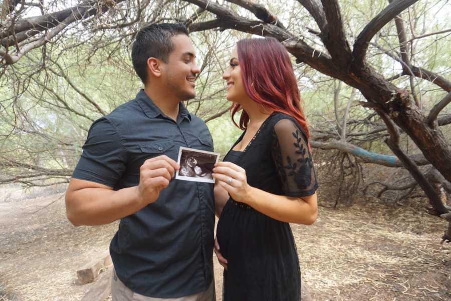 Adrian Lugo and Eliza Moody holding the ultrasound picture. (Courtesy of <a href="https://www.facebook.com/Tobiass-Journey-2637133076510838/">Eliza Moody</a>)