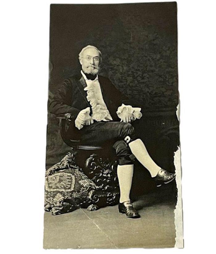 <a href="https://www.invaluable.com/auction-lot/antique-c-1900-photographer-james-ellery-hale-sit-c-0E44848940">"James Ellery Hale Sitting in a Chair in Regal Outfit Self Portrait"</a> (Courtesy of <a href="https://www.whitcombfirm.com/">David Whitcomb</a>)