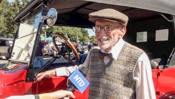 Allan Greenberg stands next to his red 1923 Model T Ford at Antique Autos in History Park in San Jose, Calif., on Sept. 19, 2021. (Ilene Eng/The Epoch Times)
