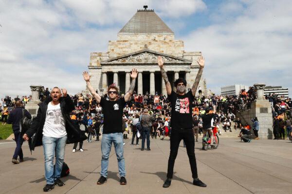 Protesters are seen at the Shrine of Remembrance in Melbourne, Australia, on Sept. 22, 2021. (Darrian Traynor/Getty Images)