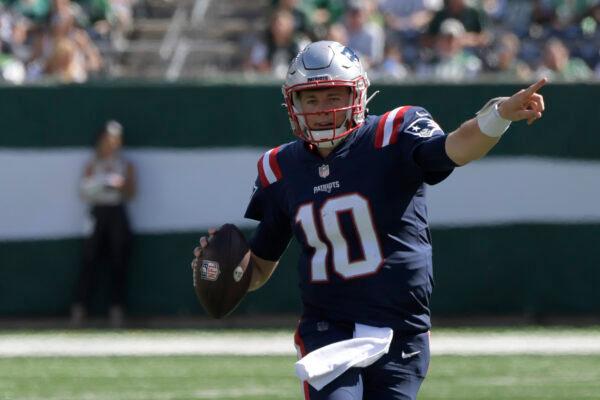 New England Patriots quarterback Mac Jones looks to throw during the first half of an NFL football game against the New York Jets, in East Rutherford, N.J., on Sept. 19, 2021. (Bill Kostroun/AP Photo)