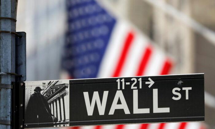 Wall Street Rises, but Tracks Steep Monthly Losses
