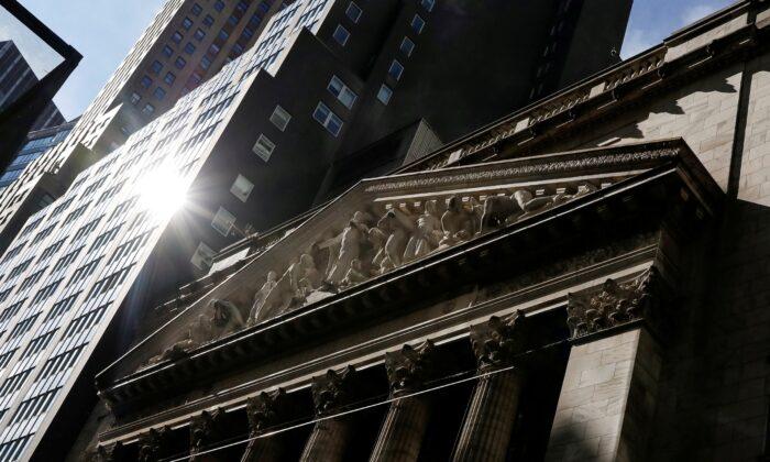 Wall Street Ends Near Flat on Cautious Note Ahead of Fed