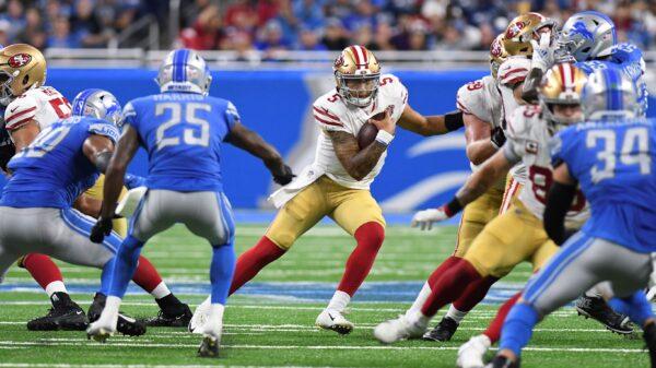 San Francisco 49ers quarterback Trey Lance (5) runs the ball against the Detroit Lions in the second half of an NFL football game in Detroit, Mich., on Sept. 12, 2021. (Lon Horwedel/AP Photo)