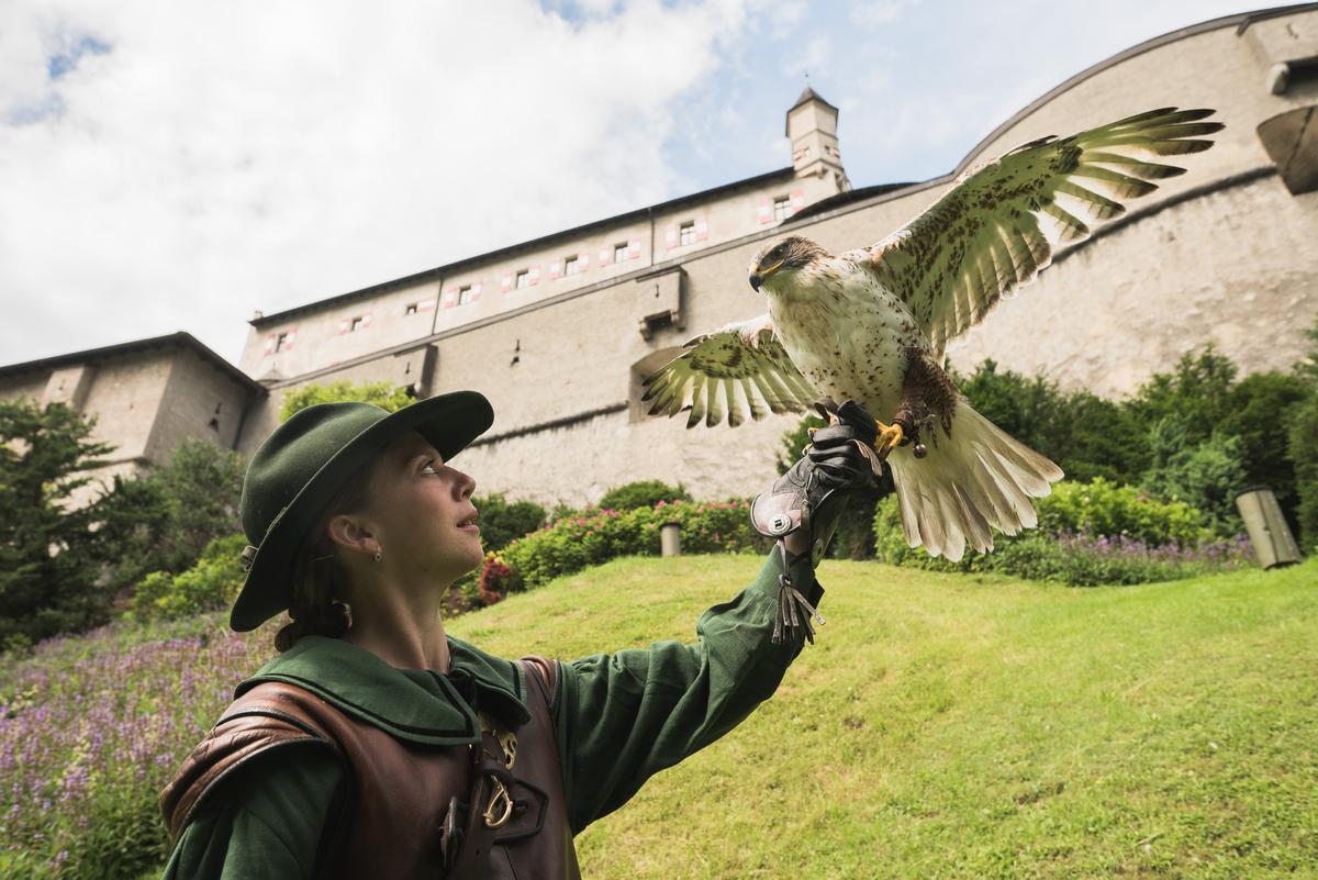 A falconer with bird of prey at Hohenwerfen. (Salzburg Burgen)