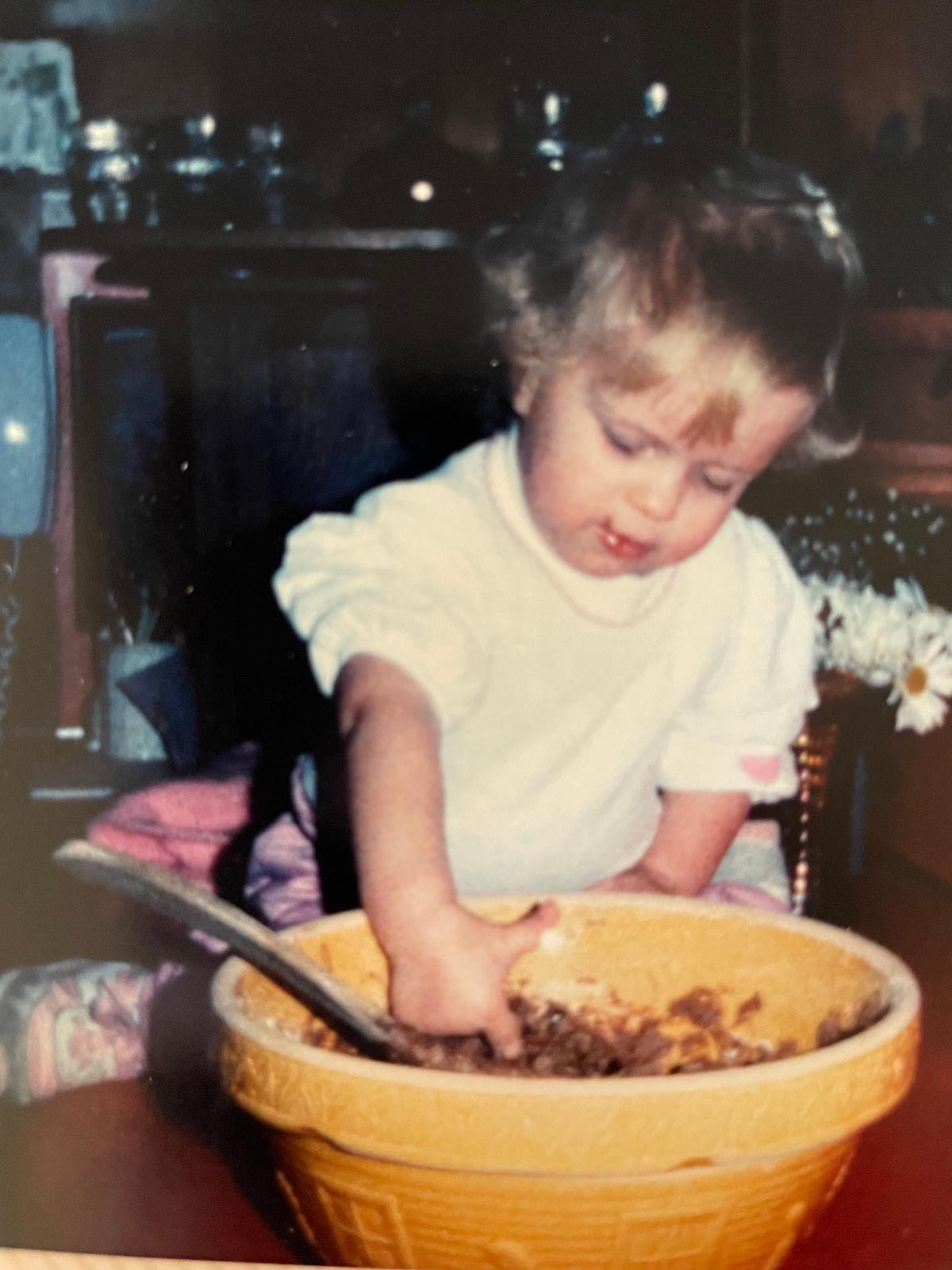 The author at her grandma's house circa 1985, doing what she did best: sampling. (Courtesy of Megan Baker)
