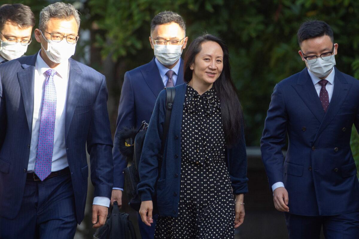 Huawei Technologies Chief Financial Officer Meng Wanzhou leaves her home to attend a virtual court hearing in Vancouver, British Columbia, Canada on Sept. 24, 2021. (Taehoon Kim/Reuters)