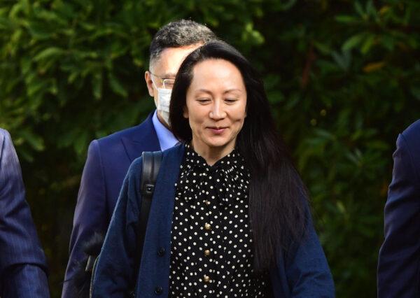 Huawei Chief Financial Officer Meng Wanzhou leaves her Vancouver home to attend a court hearing on Sept. 24, 2021. (Don MacKinnon/AFP via Getty Images)