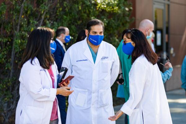 Health care workers at St. Joseph Hospital in Orange, Calif., on Dec. 16, 2020. (John Fredricks/The Epoch Times)