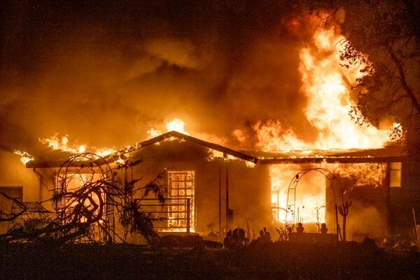A house burns on Platina Road at the Zogg Fire near Ono, Calif., on Sept. 27, 2020. (Ethan Swope/AP Photo)