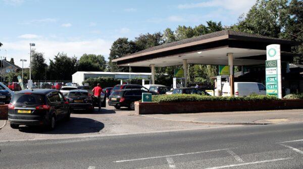 Vehicles queue up to enter the BP petrol station in Harpenden, Britain, on Sept. 24, 2021. (Peter Cziborra/Reuters)