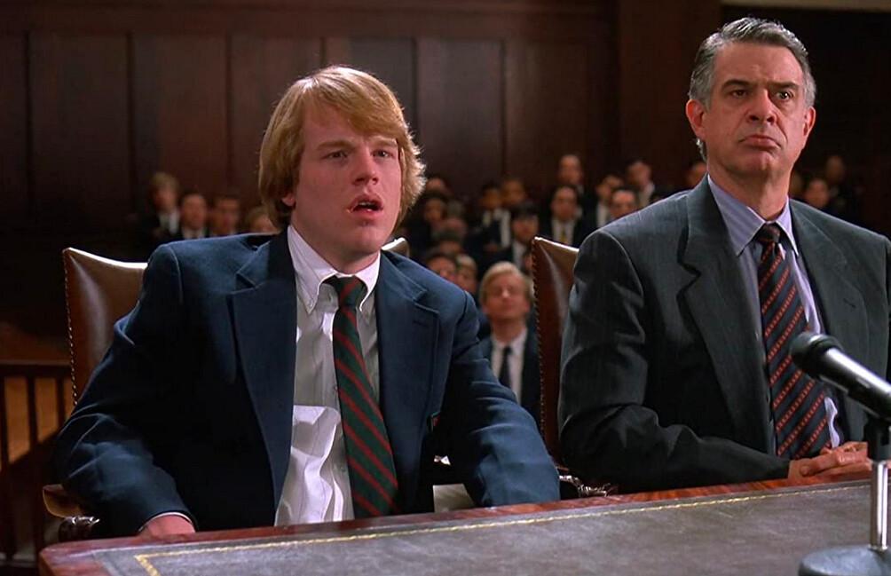 George Willis Jr. (Philip Seymour Hoffman, L) and George Willis Sr. (Baxter Harris) are flabbergasted when their expectations of exoneration are dashed, in "Scent of a Woman." (Universal Pictures)