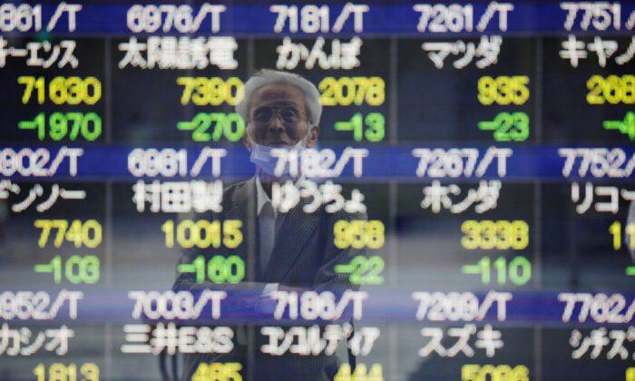 European Shares Fall on Evergrande Fears but Hold Weekly Gains