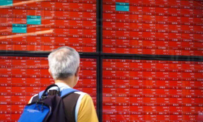 Asian Stock Markets Jittery as China Evergrande Woes Sap Confidence