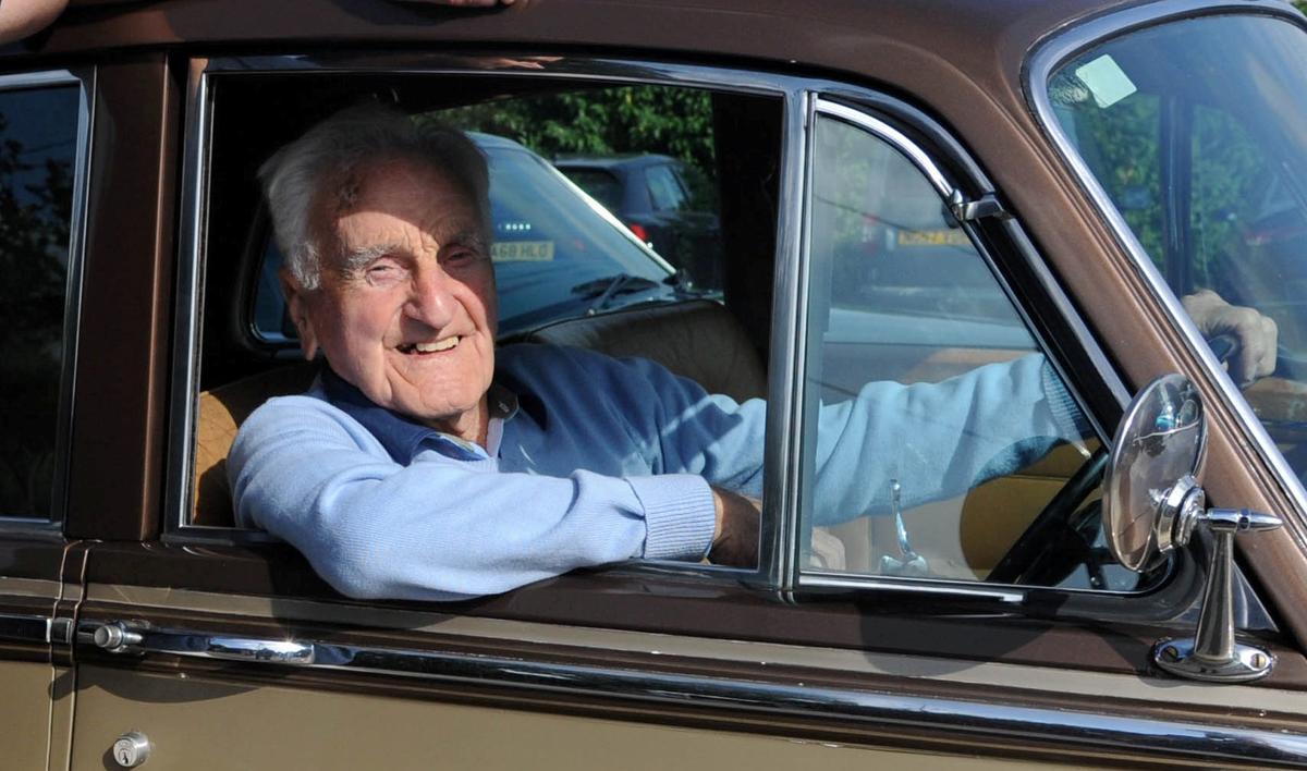 Back at the wheel, Eddie Hughes poses in the ‘63 Series 3 Bentley he used to drive as a chauffeur. (SWNS)