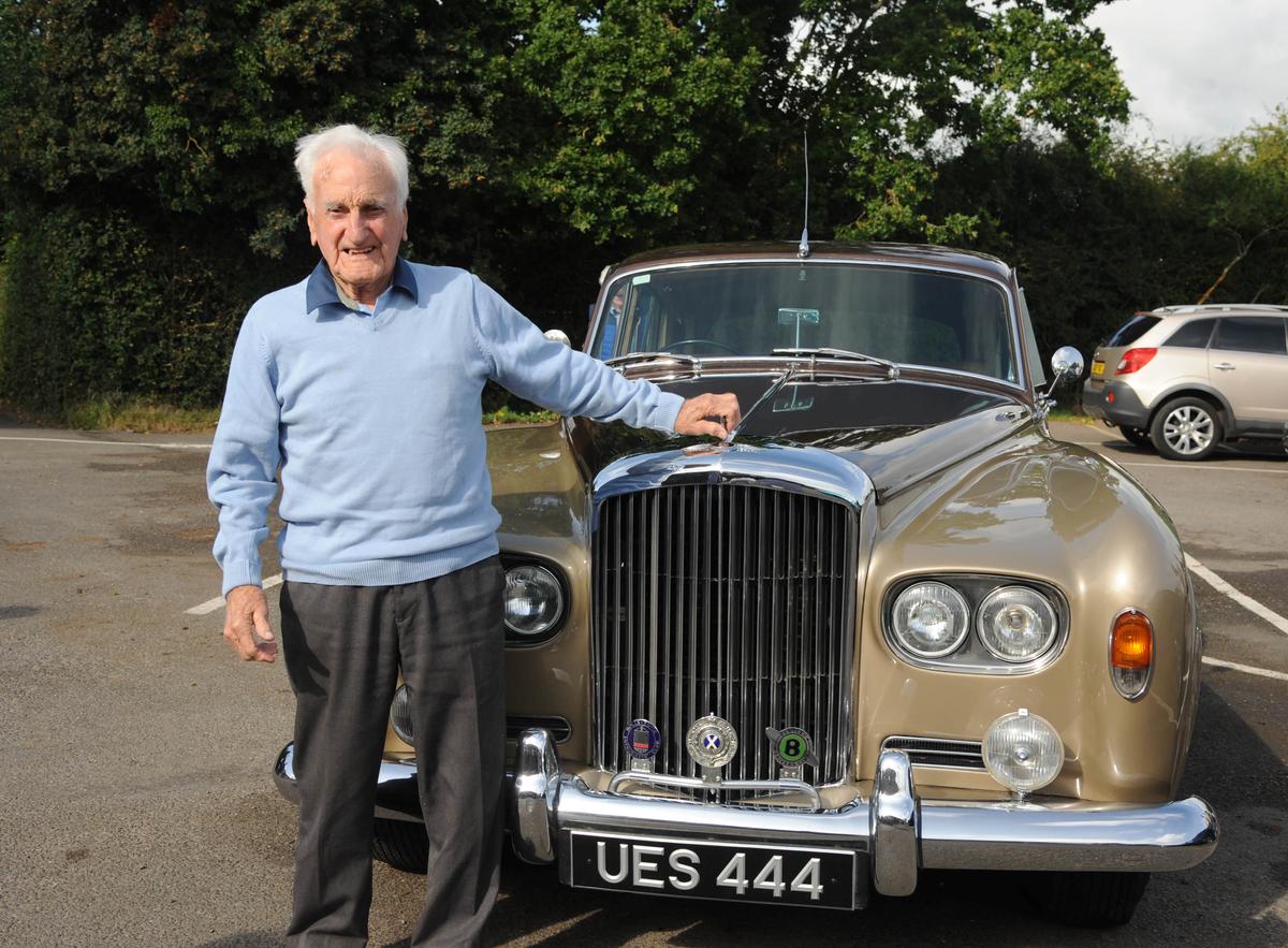 Eddie Hughes stands beside his Series 3 Bentley which he used to drive as a chauffeur. (SWNS)