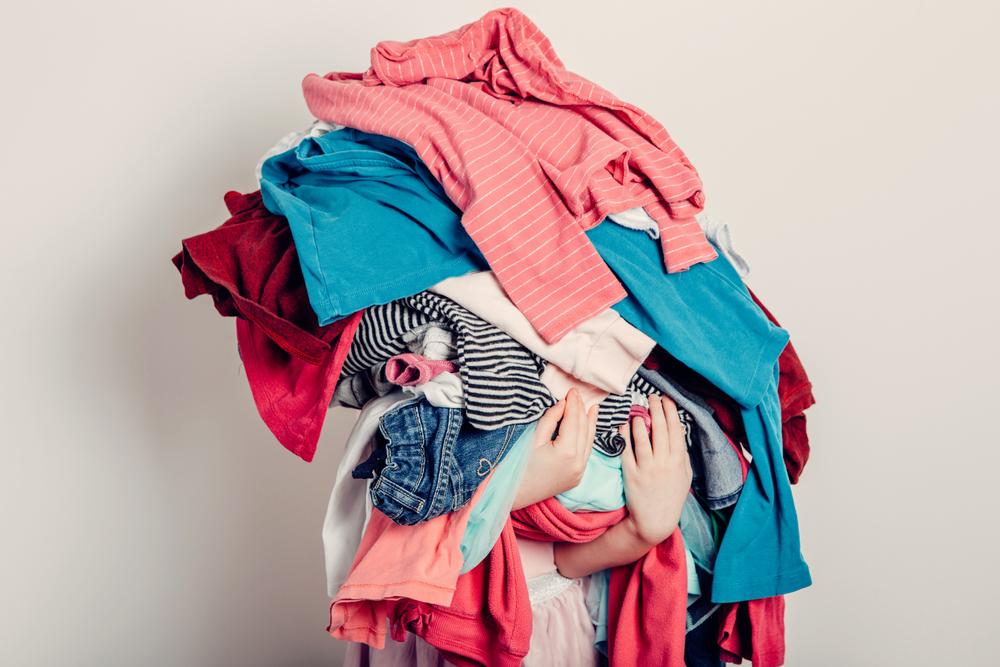 Consider donating or consigning items of clothing that haven't been worn in the past year, and filling in any gaps with staples that will stand the test of time. (Anna Kraynova/Shutterstock)