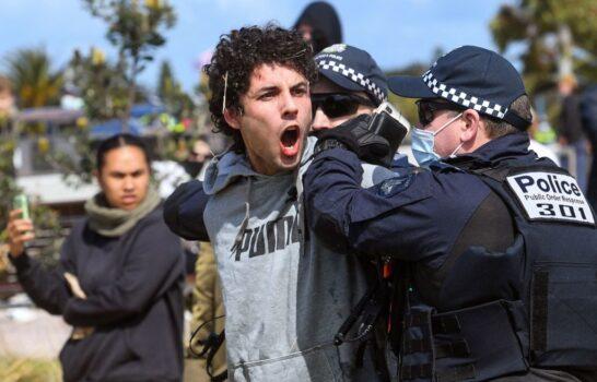 During an anti-lockdown rally, police arrested a protester at St Kilda in Melbourne on Sept.25, 2021. (William West/AFP via Getty Images)