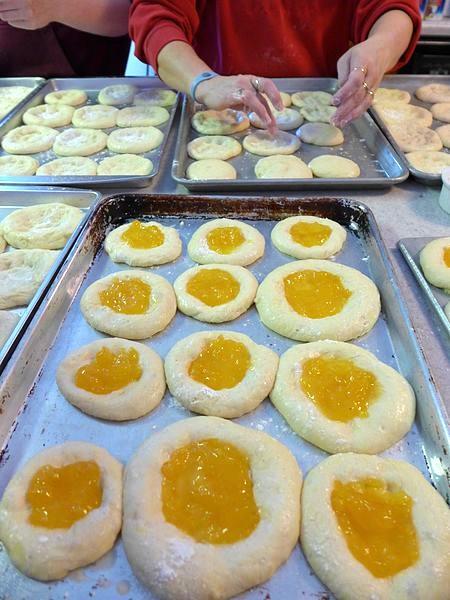 Making kolache by hand is a time-intensive labor of love, traditionally done in groups for special occasions and gatherings. (Wikimedia/Kolach)