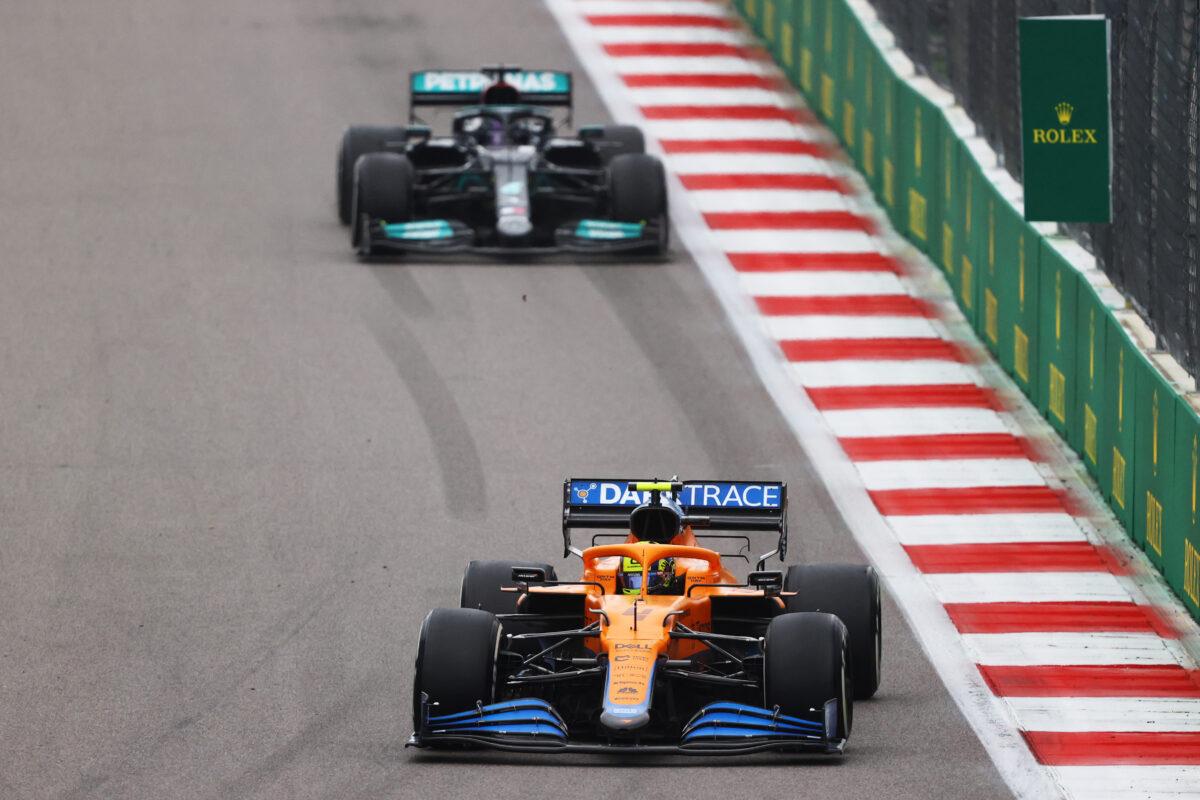 Lando Norris of Great Britain driving the (4) McLaren F1 Team MCL35M Mercedes leads Lewis Hamilton of Great Britain driving the (44) Mercedes AMG Petronas F1 Team Mercedes W12 during the F1 Grand Prix of Russia at Sochi Autodrom in Sochi, Russia, on Sept. 26, 2021. (Bryn Lennon/Getty Images)
