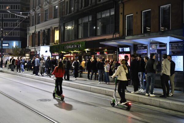 People out on the streets to celebrate the end of the COVID-19 restrictions, in Oslo, on Sept. 25, 2021. (Naina Helen Jama/NTB via AP)