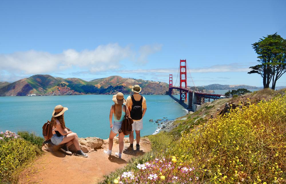 Visitors look out to the Golden Gate Bridge in San Francisco. (Margaret.Wiktor/Shutterstock)